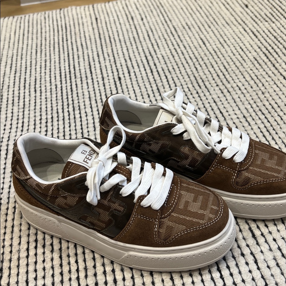 Brown and White Sneakers with platform sole. NWT. 
Size 39, fits 8 or 8.5 us